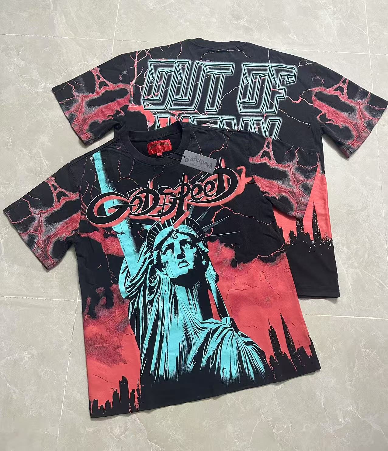 Godspeed Out of Many One Statue Graphic T-Shirt — context