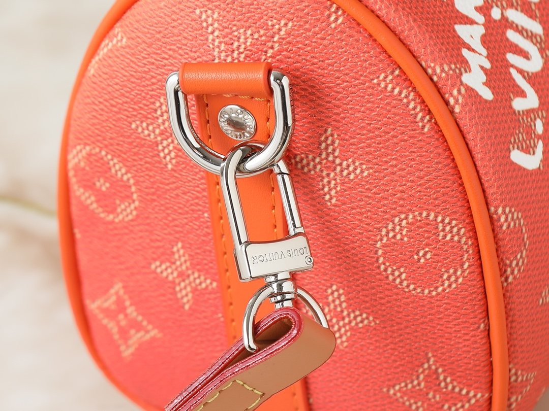 Louis Vuitton Keepall Orange Monogram Barrel Bag — detail