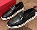 Salvatore Ferragamo Black Loafers with White Soles — hero
