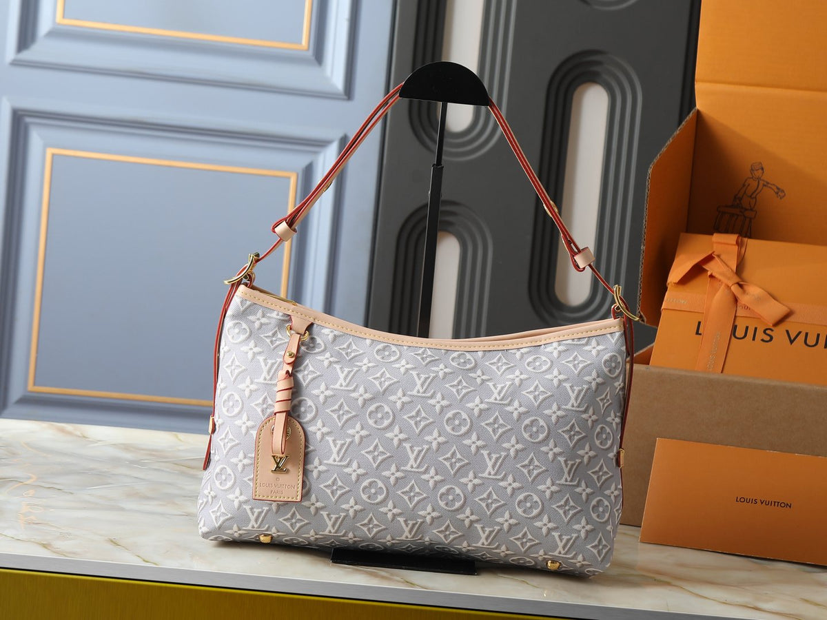 Louis Vuitton Carryall East-West Monogram Emblème Shoulder Bag — hero