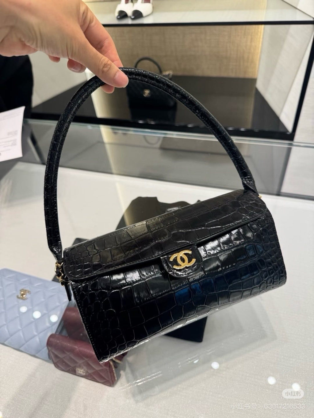 Chanel Crocodile-Embossed Top-Handle Flap Bag — model