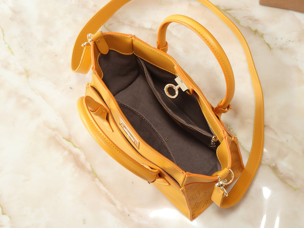 Louis Vuitton On My Side Turn-Lock Tote — detail