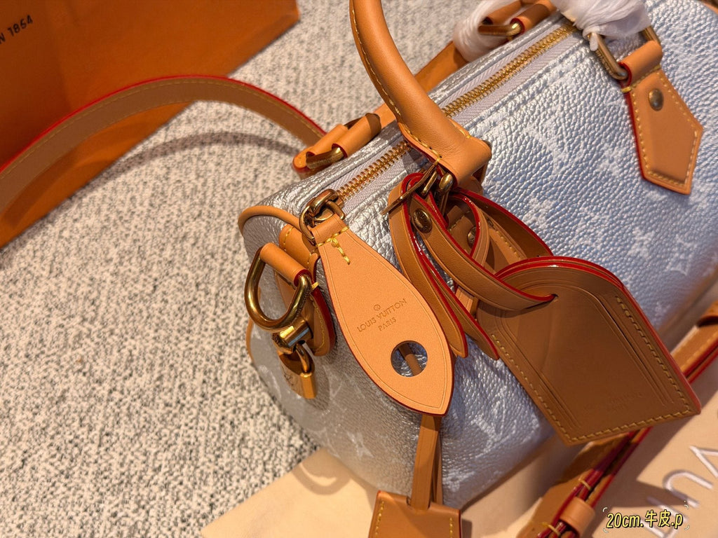 Louis Vuitton Speedy Rolled-Handle Satchel — detail