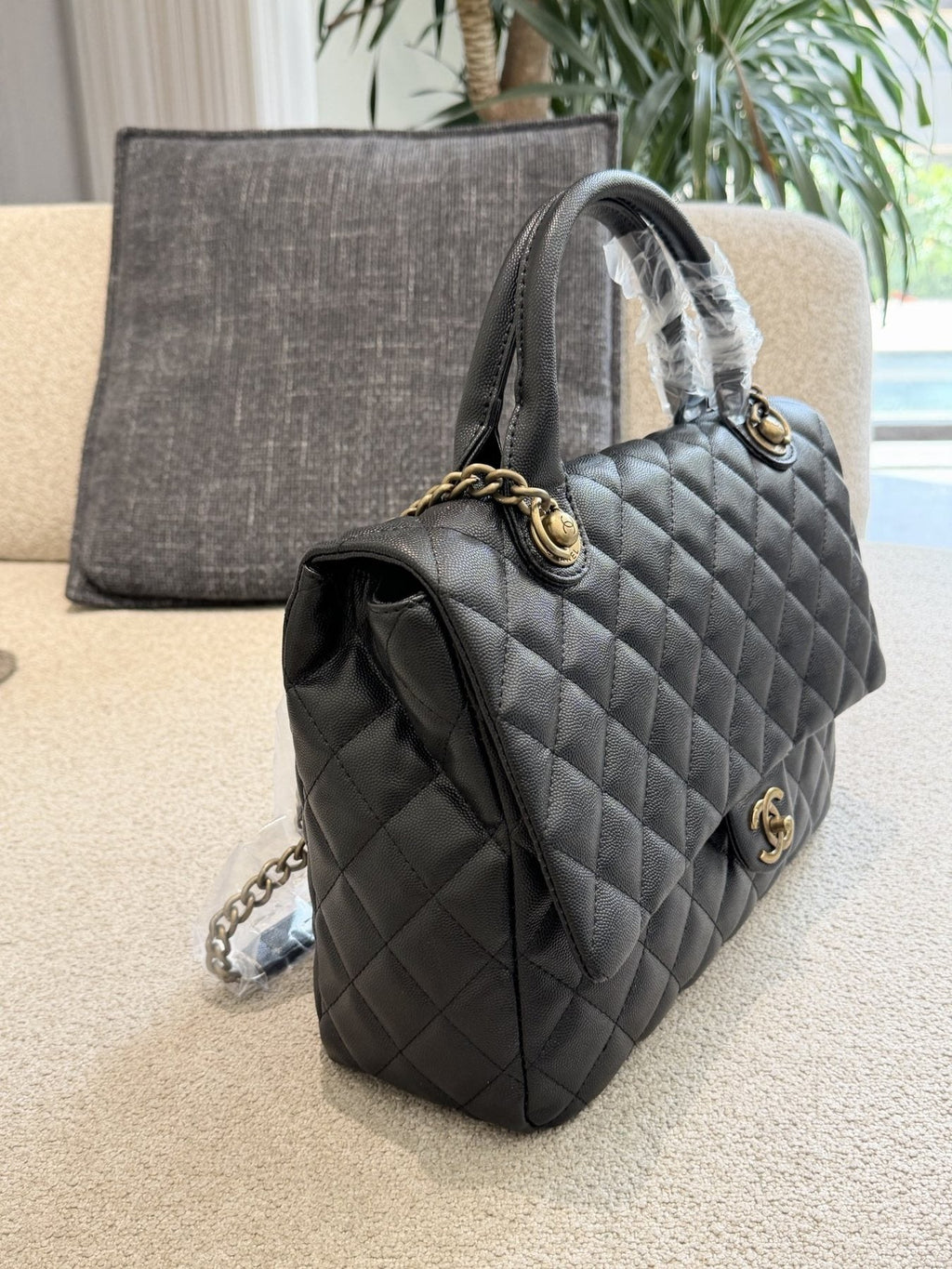 Chanel Diamond-Quilted Top-Handle Flap Bag — side