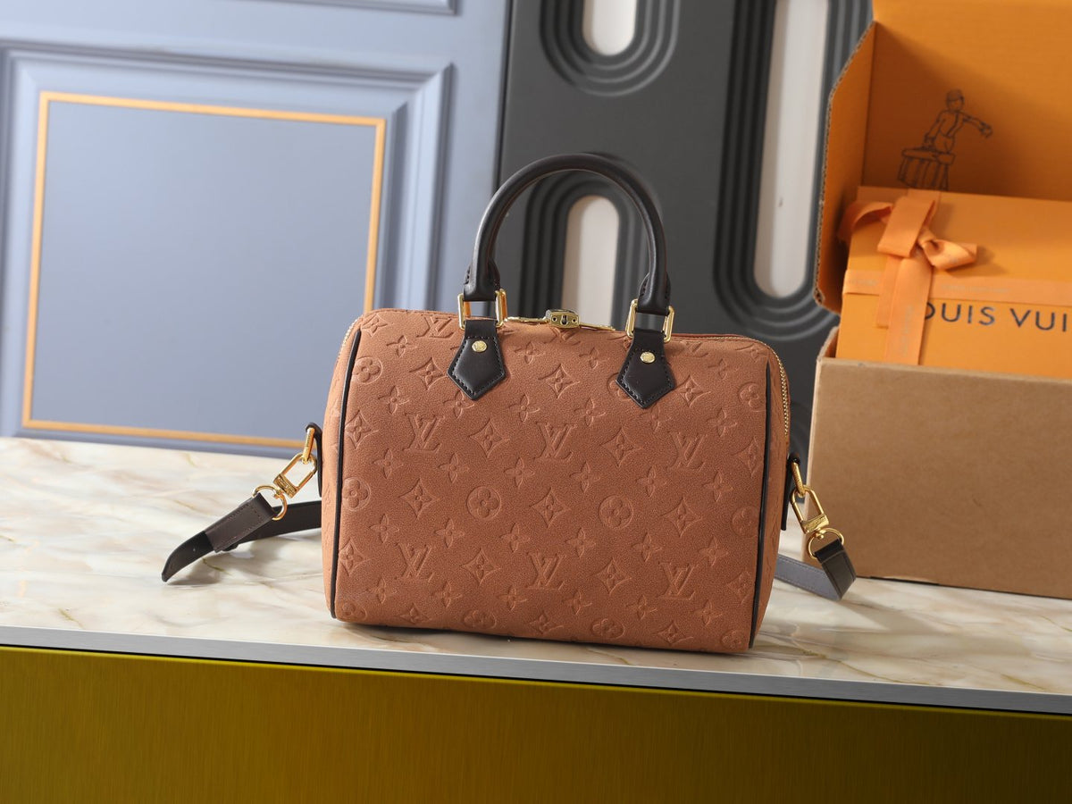 Louis Vuitton Speedy Bandoulière Embossed Suede Handbag — hero