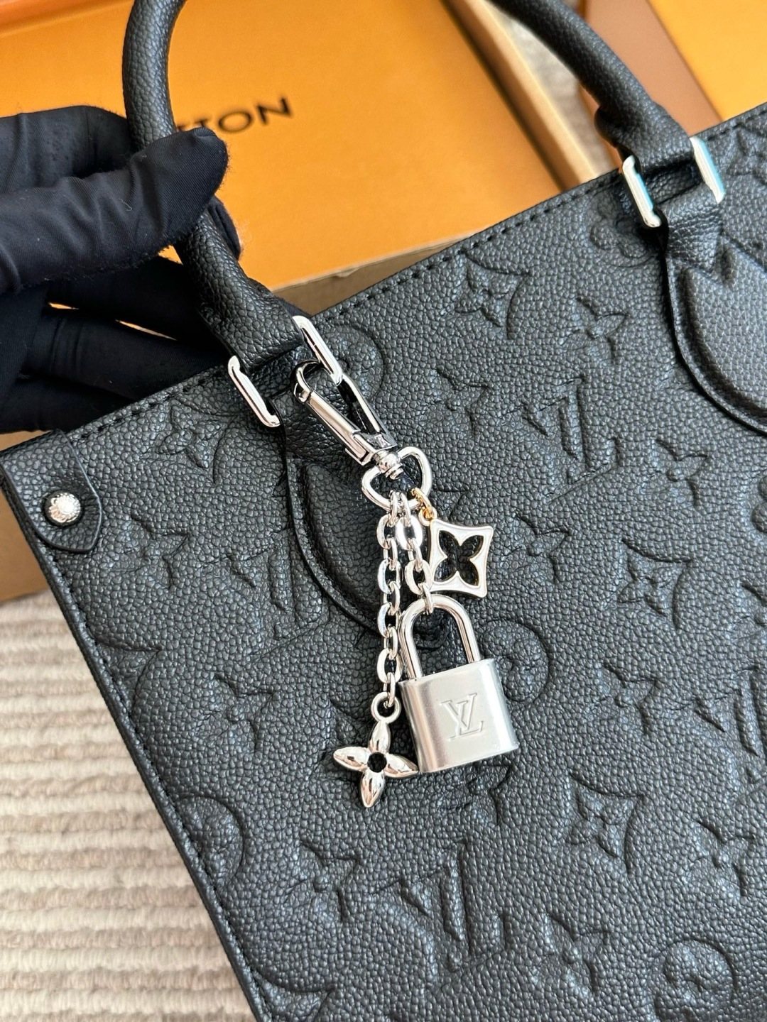 Louis Vuitton Onthego Black Embossed Tote — detail