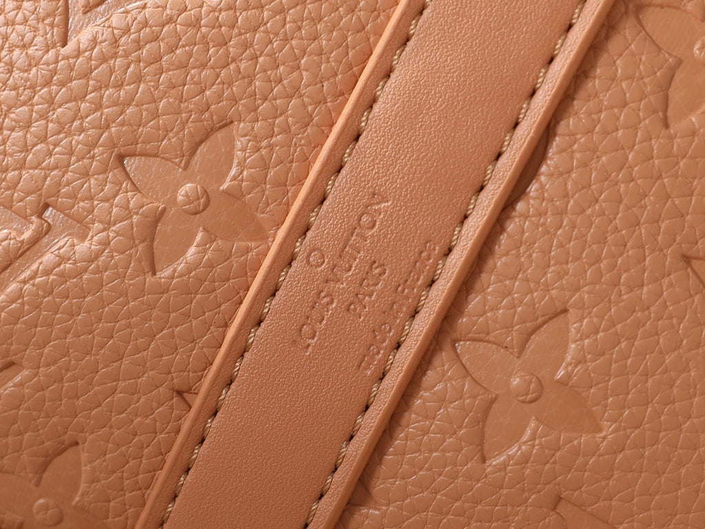 Louis Vuitton Speedy Soft Monogram Empreinte Handbag — detail