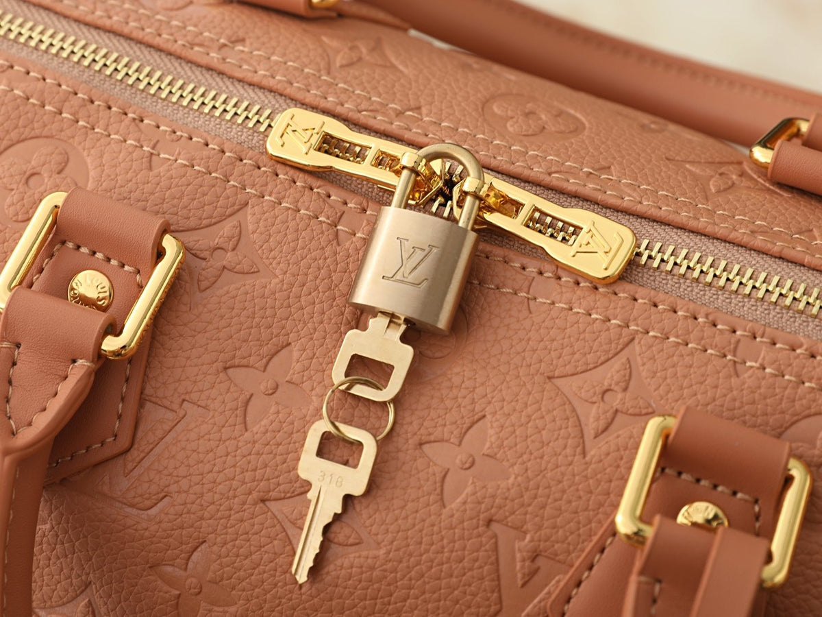 Louis Vuitton Speedy Soft Monogram Empreinte Handbag — detail