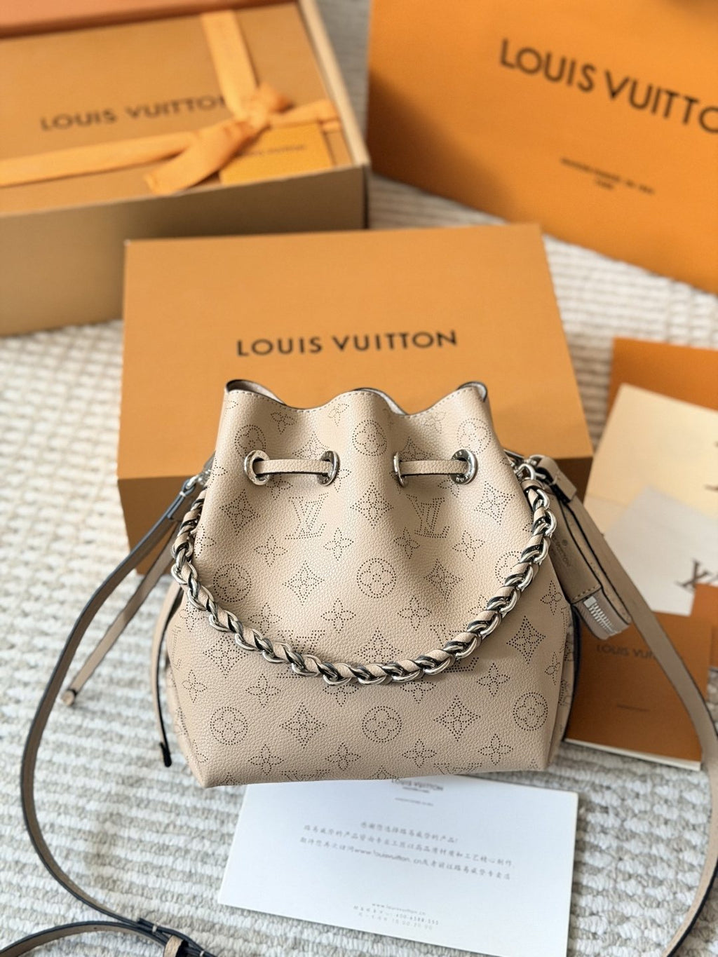 Louis Vuitton Bella Perforated Monogram Bucket Bag — front