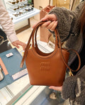 Miu Miu Ivy Circular-Handle Handbag — hero