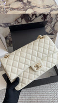 Chanel Quilted Grained Leather Flap Shoulder Bag — hero