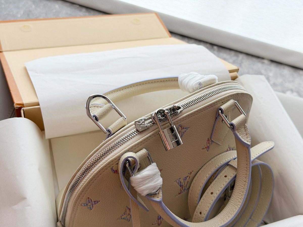 Louis Vuitton Alma Pastel Monogram Handbag — detail