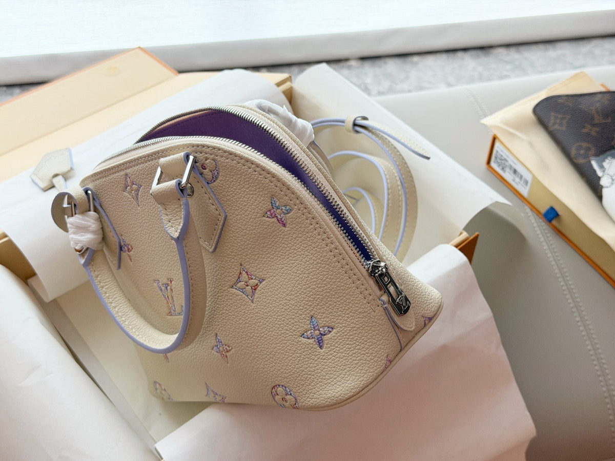 Louis Vuitton Alma Pastel Monogram Handbag — detail