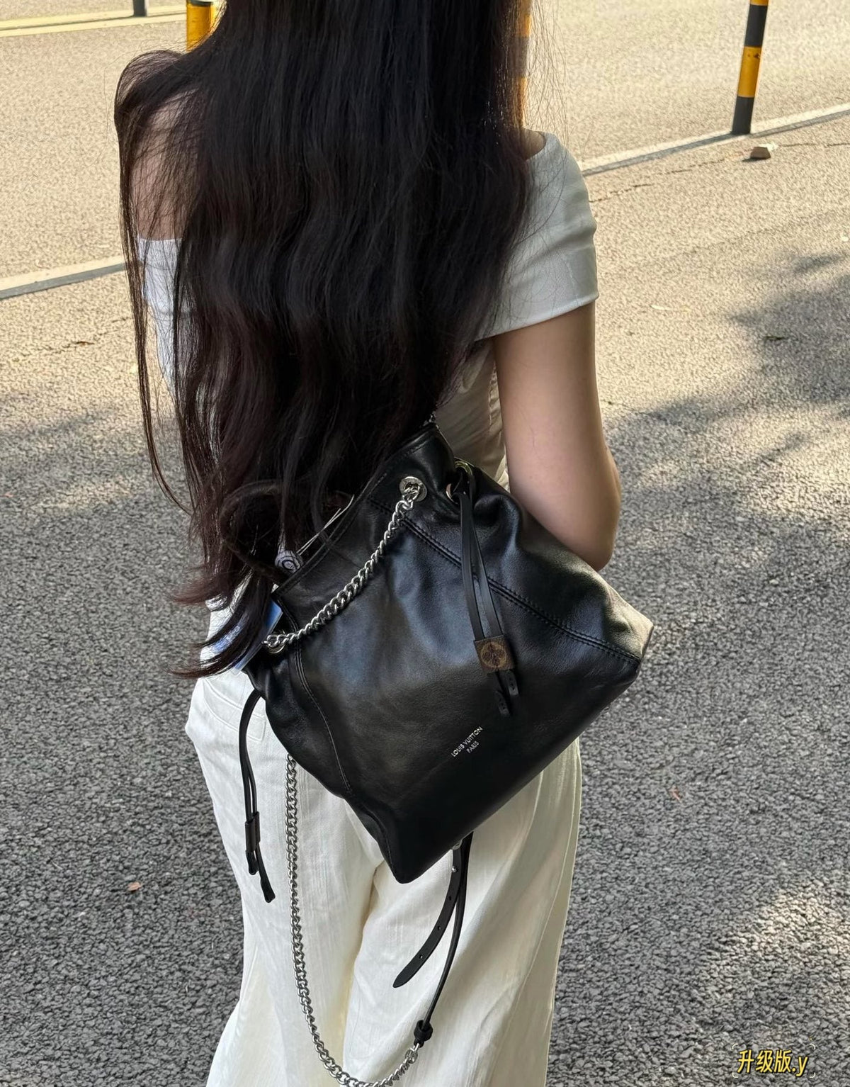 Louis Vuitton Off Duty Black Chain Handbag — model