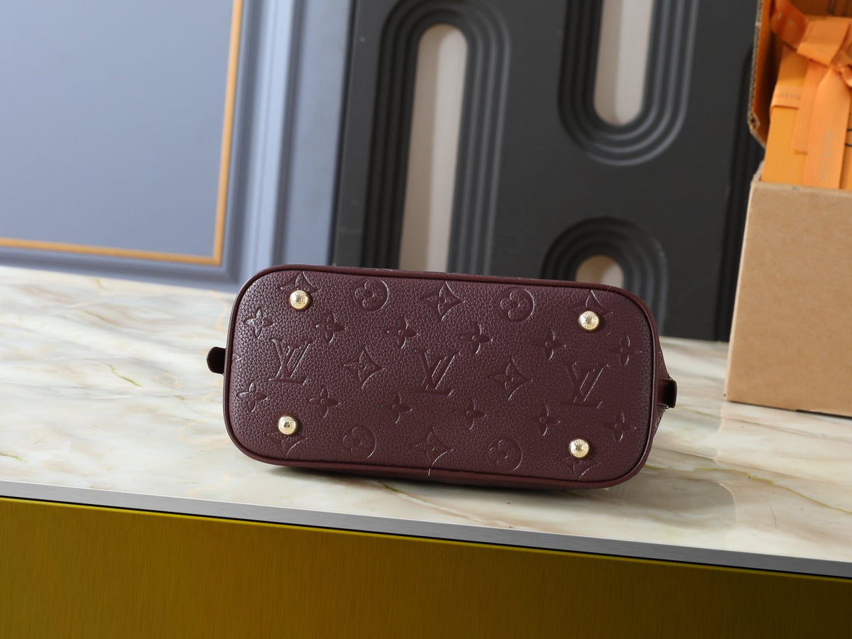 Louis Vuitton Alma BB Monogram Empreinte Bag — detail