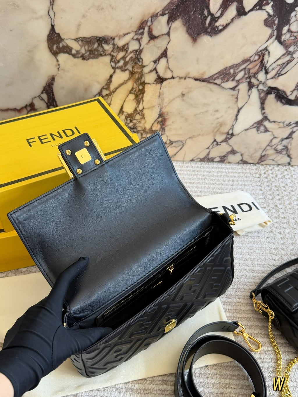 Fendi Baguette Raised FF Motif Bag — front