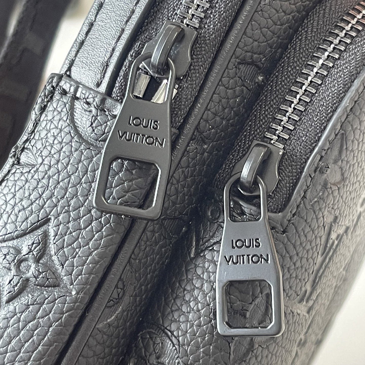 Louis Vuitton Avenue Sling Bag PM in Black Embossed Leather — detail