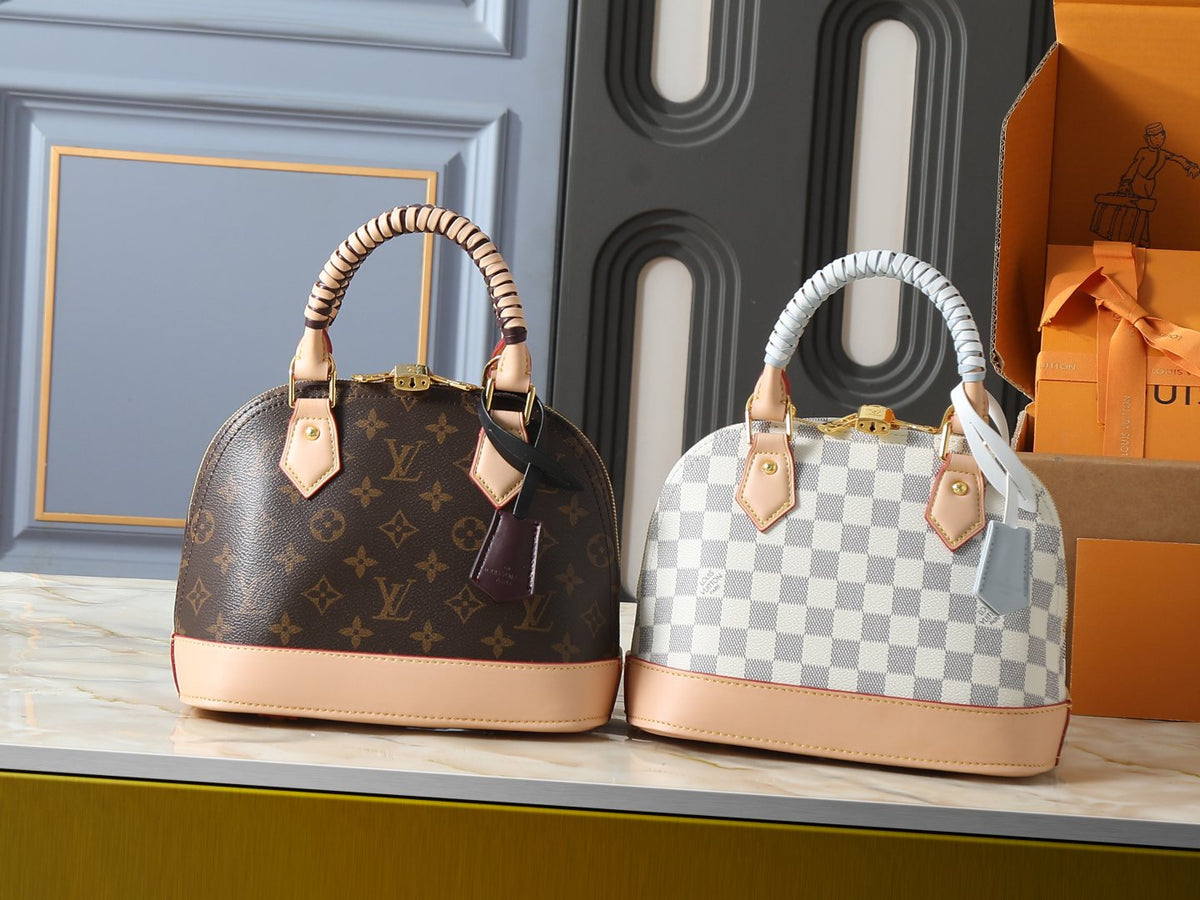 Louis Vuitton Alma Structured Top-Handle Bag — comparison