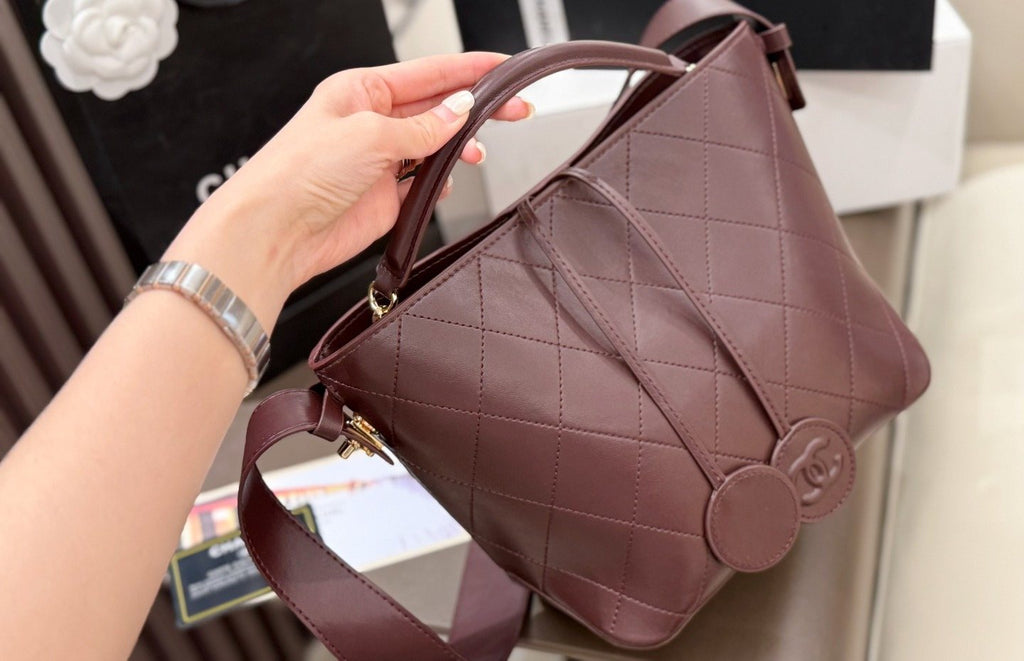 Chanel Diamond-Quilted Pendant Bucket Bag — detail