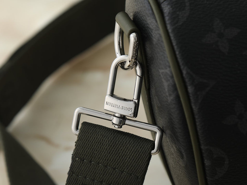 Louis Vuitton Keepall Bandoulière Duffel Bag — detail