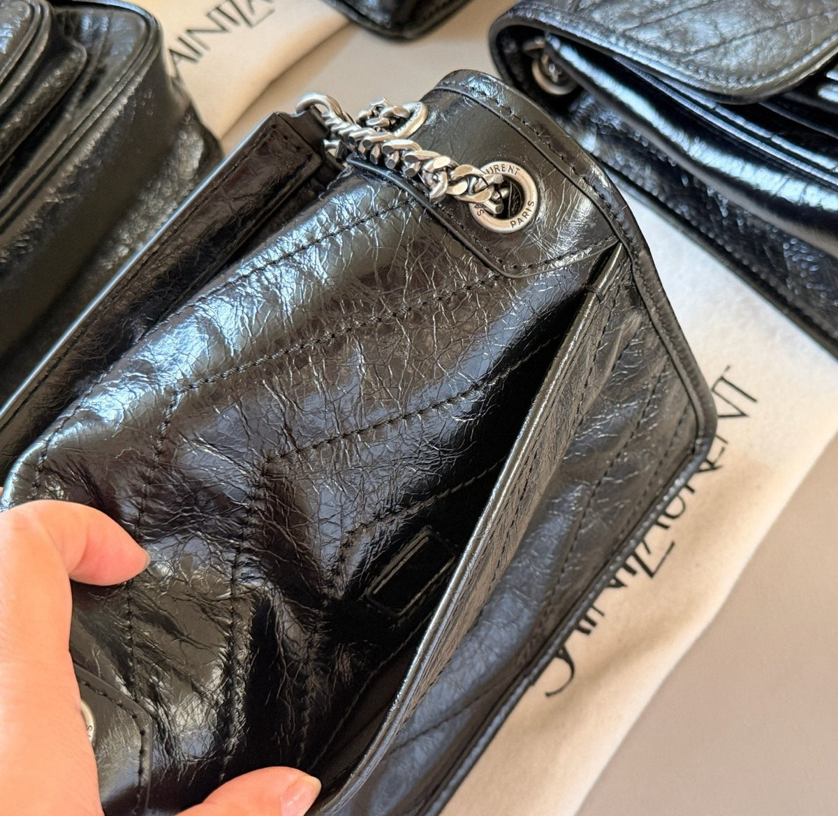 Saint Laurent Niki Chevron-Quilted Shoulder Bag — detail