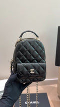 Chanel Quilted Top-Handle Backpack — hero
