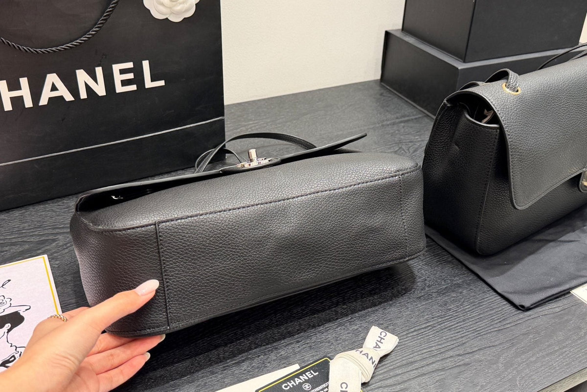 Chanel Maxi Flap Pebbled Shoulder Bag — detail