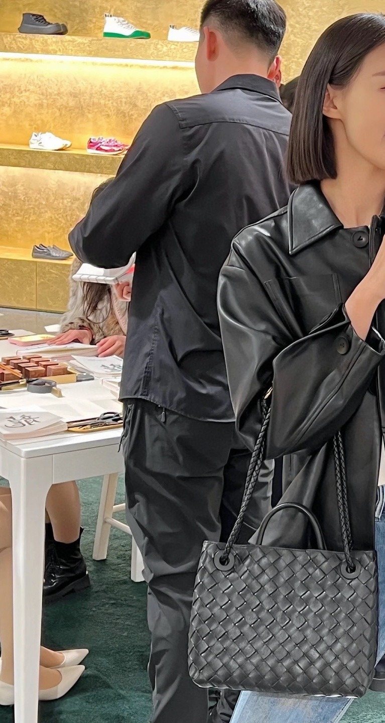 Bottega Veneta Andiamo Woven Tote Bag — model