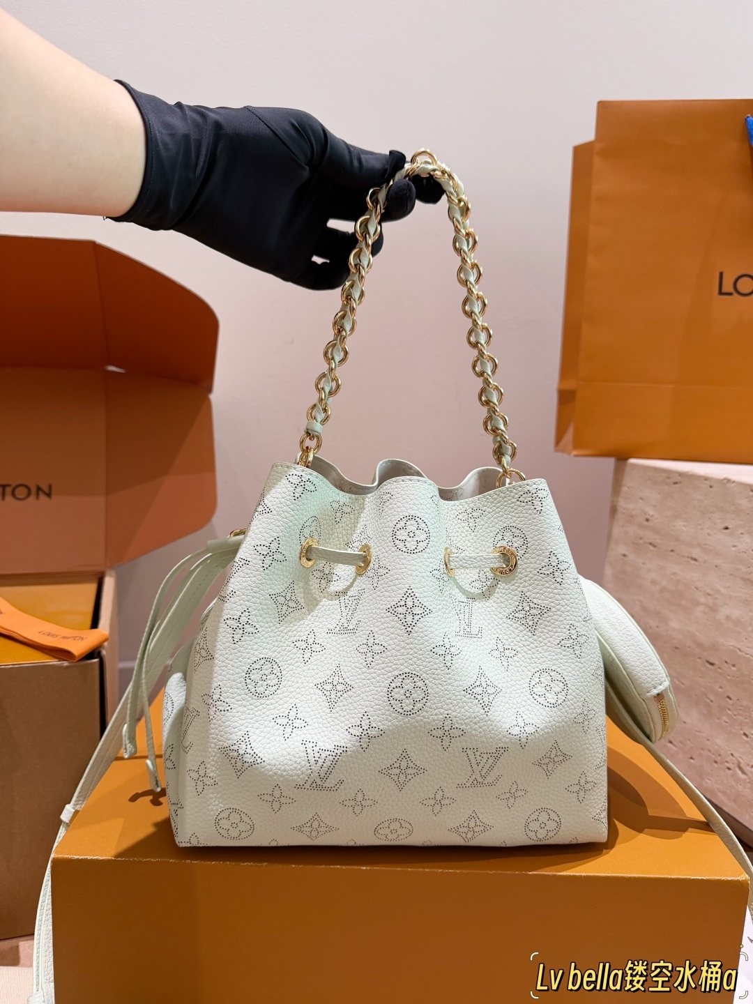 Louis Vuitton Bella Monogram Bucket Bag — model