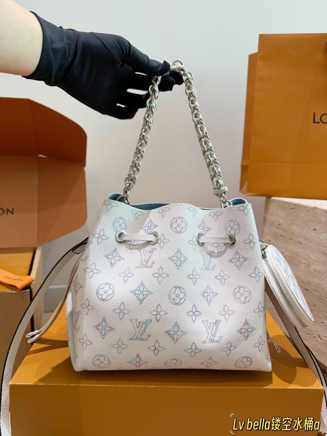 Louis Vuitton Bella Monogram Bucket Bag — model