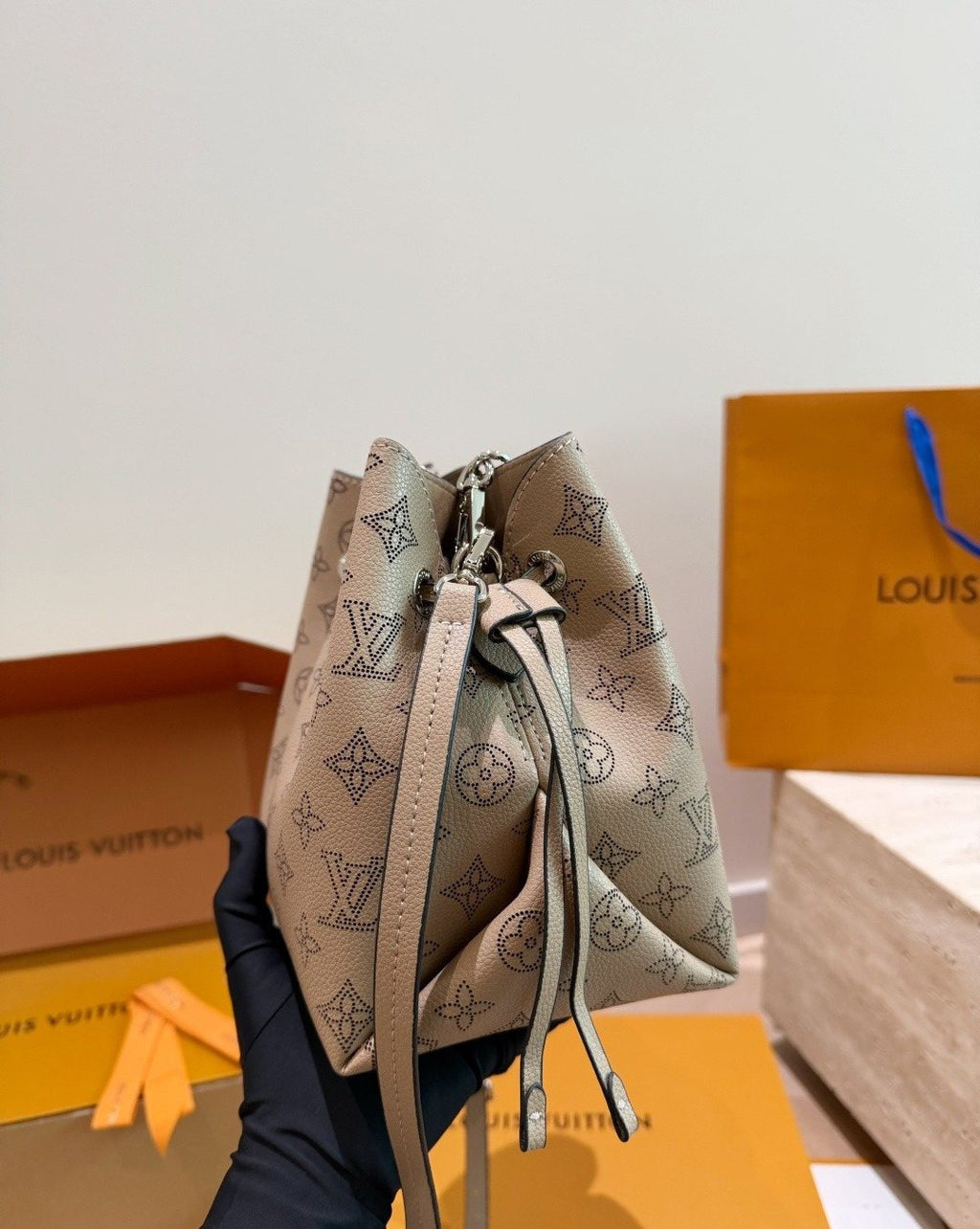 Louis Vuitton Bella Monogram Bucket Bag — side