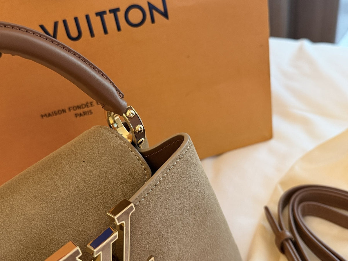 Louis Vuitton Capucines Suede-Textured Top-Handle Bag — detail