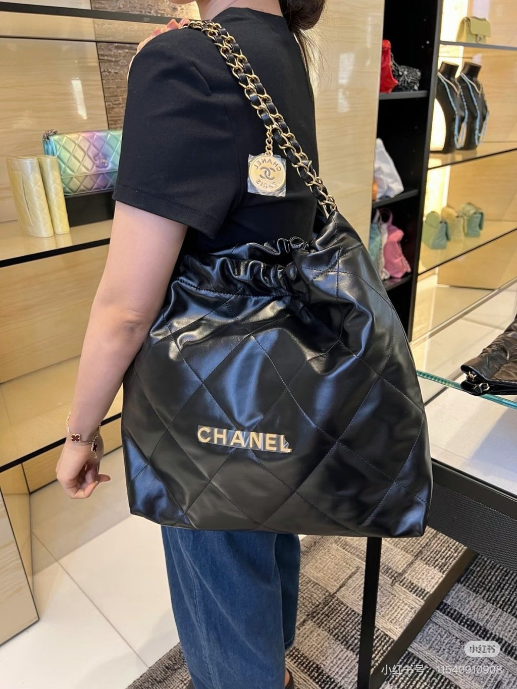 Chanel 22 Quilted Chain Shoulder Bag — model
