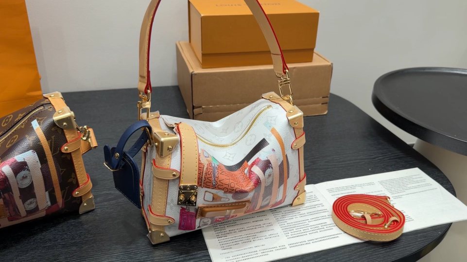 Louis Vuitton Side Trunk Illustrated Monogram Handbag — hero
