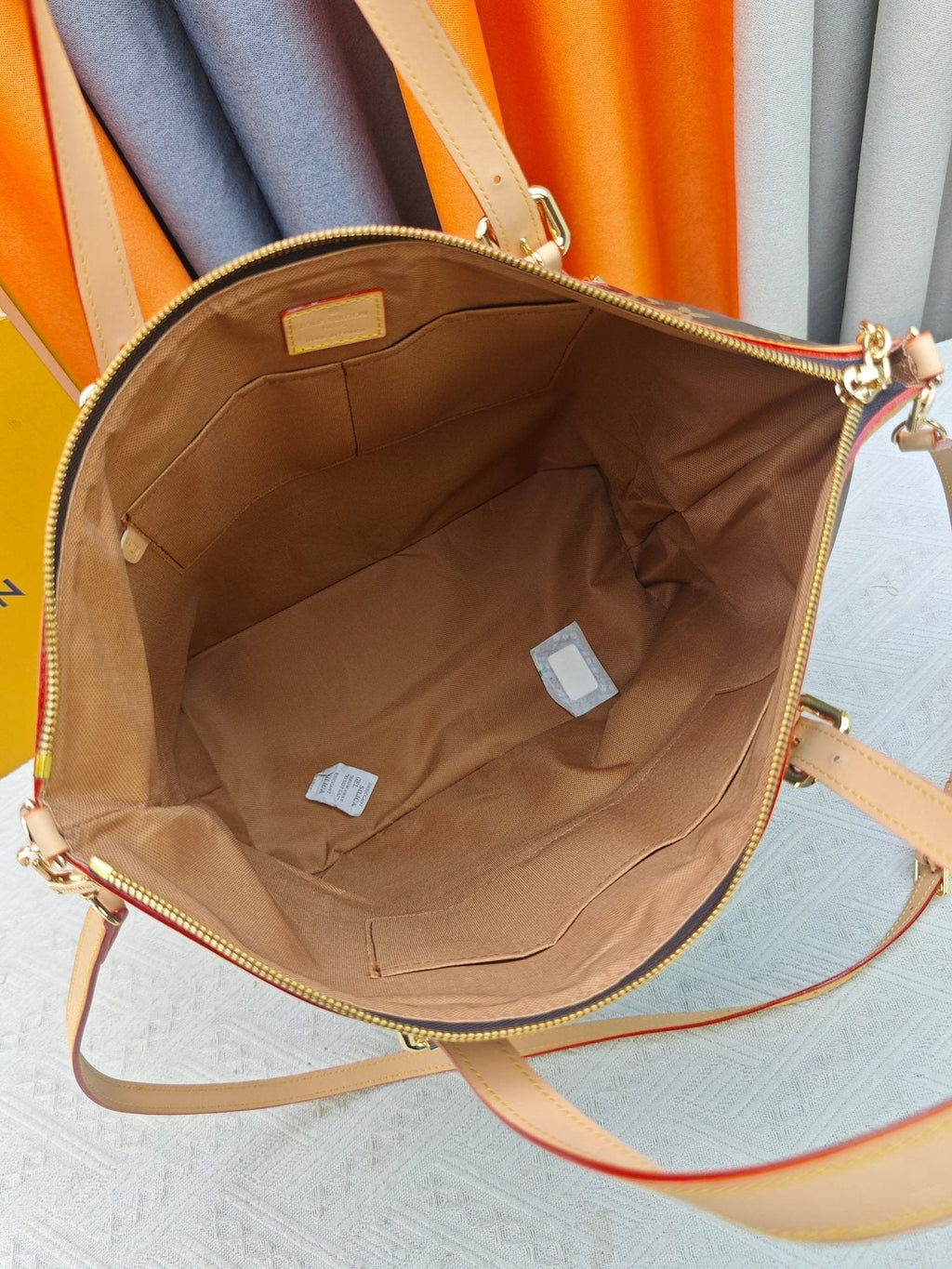 Louis Vuitton Pleated Monogram Tote — detail