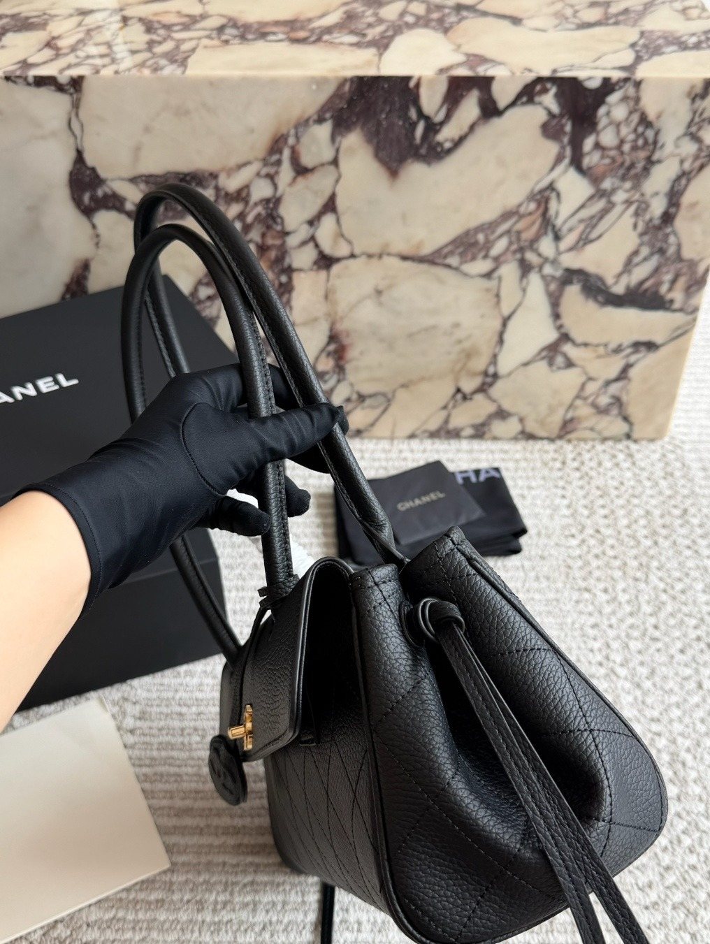 Chanel Quilted Baguette Shoulder Bag — side