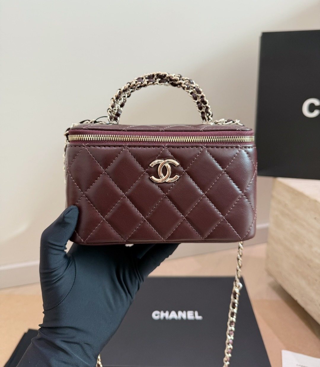 Chanel Quilted Top-Handle Box Bag — model