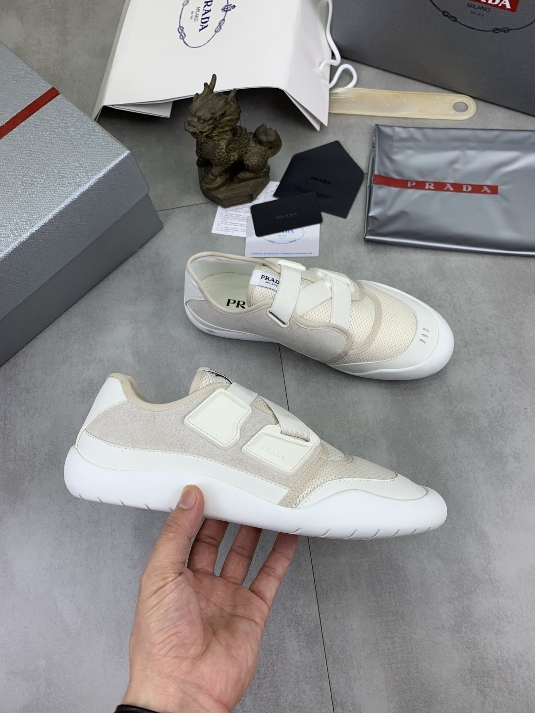 Prada Cross-Strap Low-Top Sneakers — side