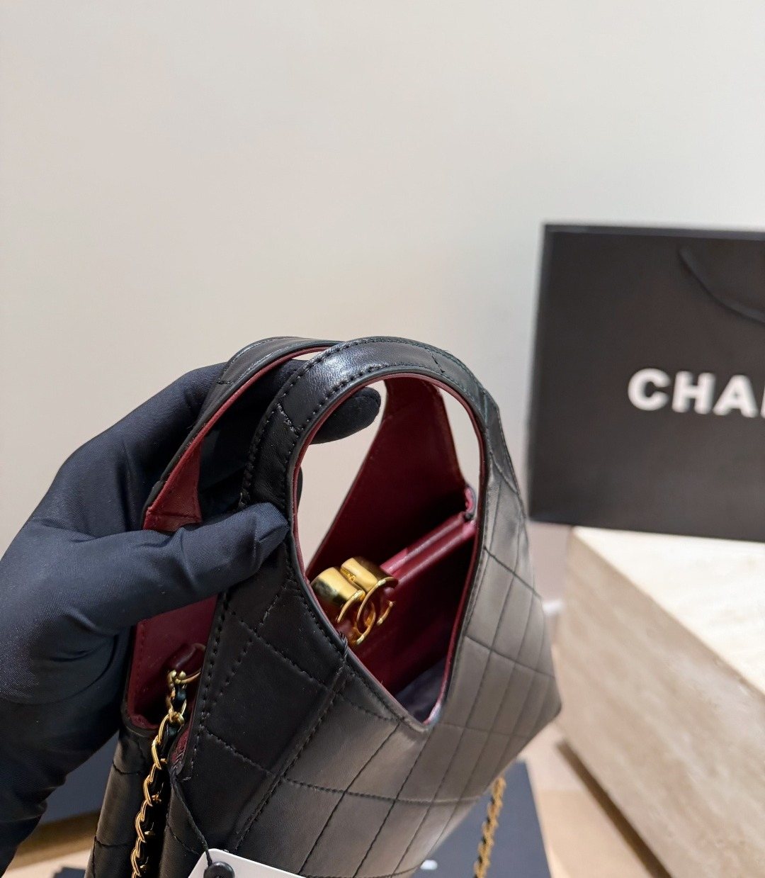 Chanel Diamond-Quilted Integrated-Handle Hobo Bag — detail