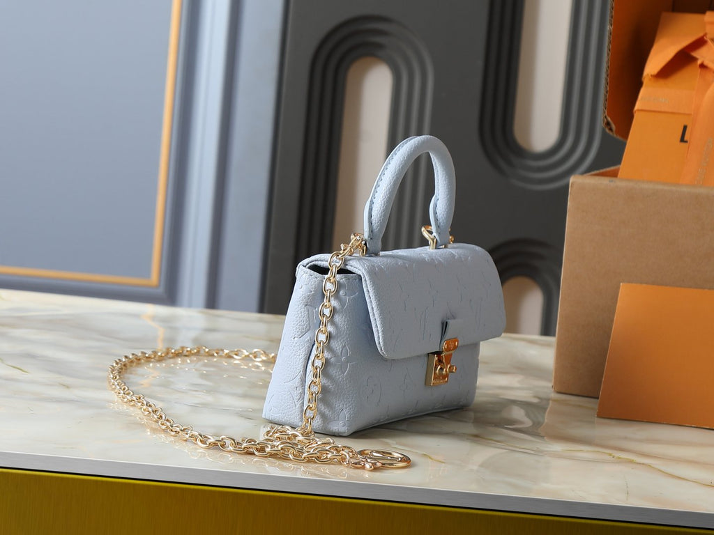 Louis Vuitton Nano Madeleine Monogram Empreinte Handbag — side