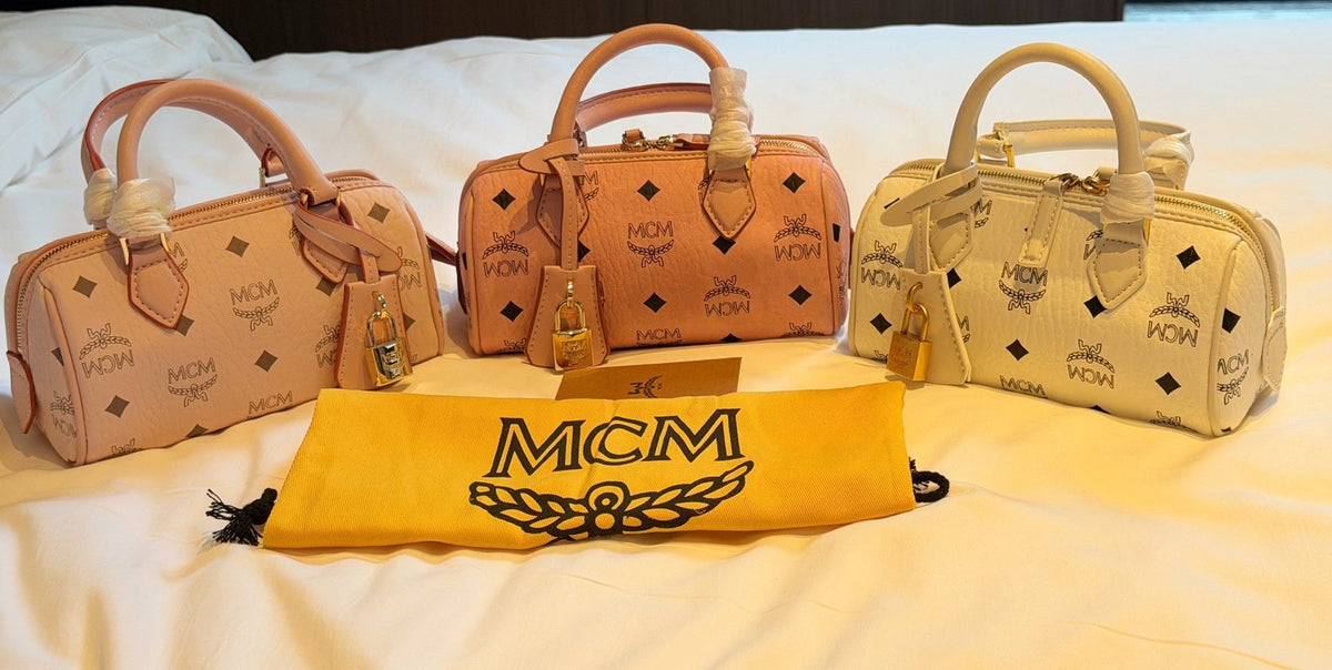 MCM Boston Printed Satchel Bag — comparison