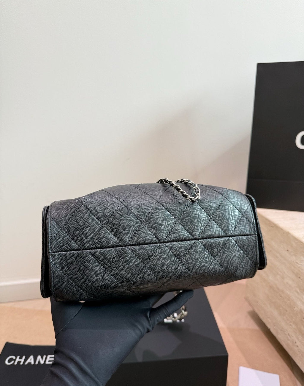 Chanel 25 Quilted Drawstring Bucket Bag — detail