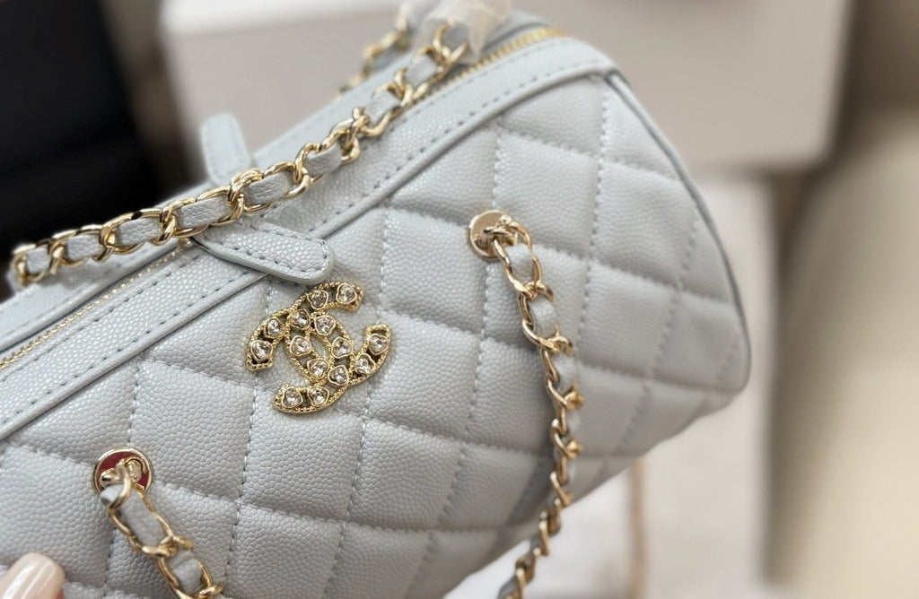 Chanel Quilted Bowling Bag with Jeweled CC Emblem — detail