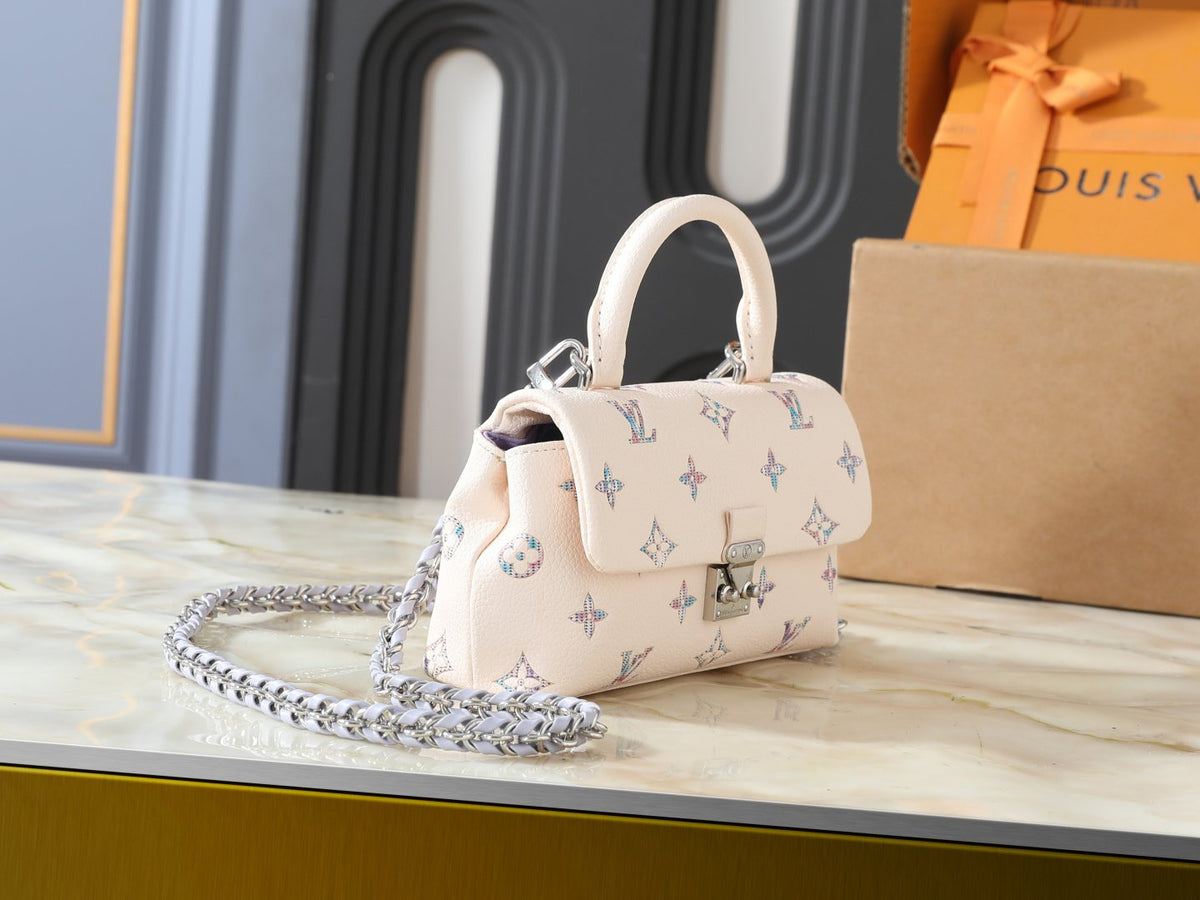 Louis Vuitton Nano Madeleine Monogram Top-Handle Bag — side