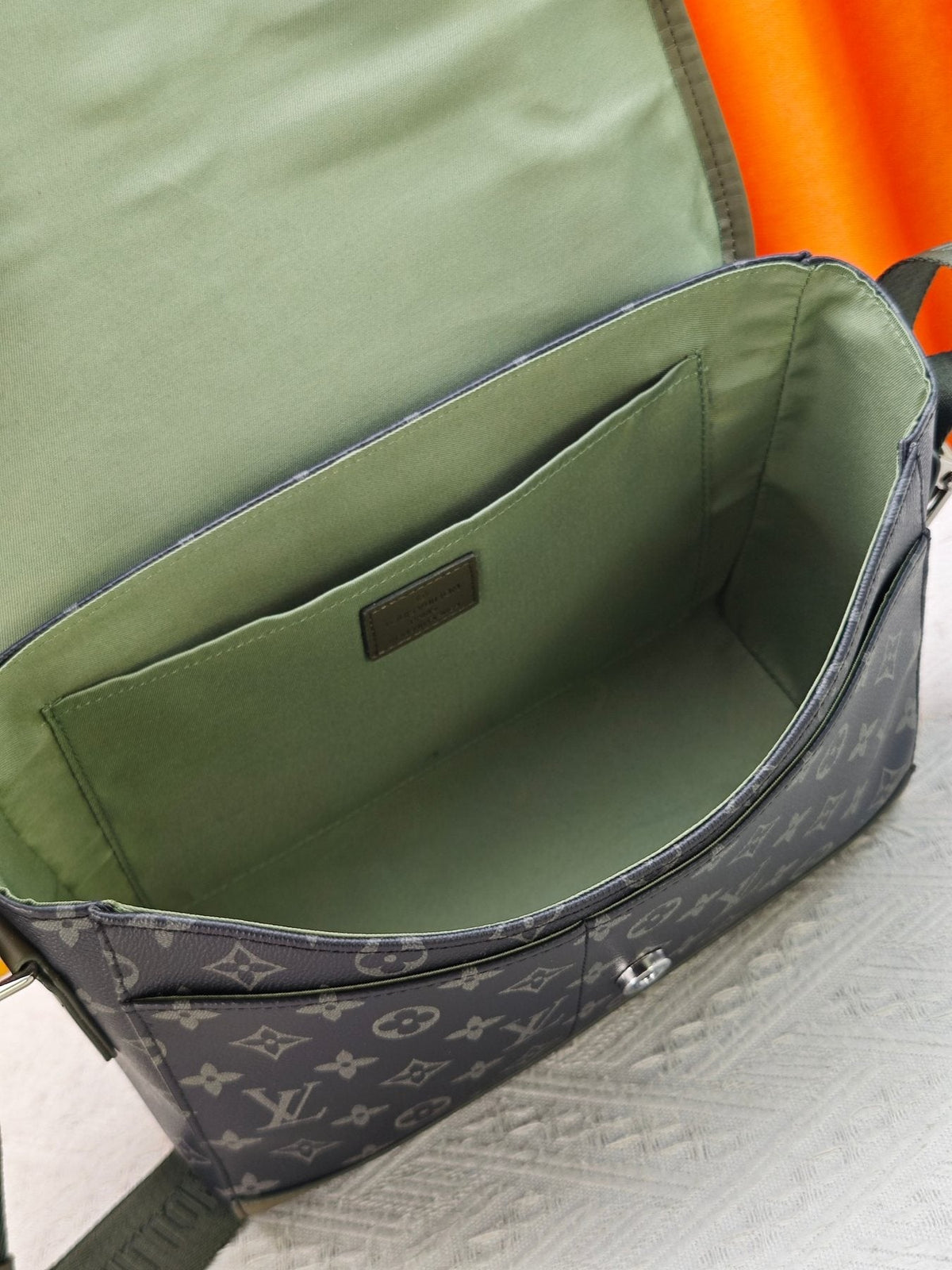 Louis Vuitton Courrier Monogram Messenger Bag — detail