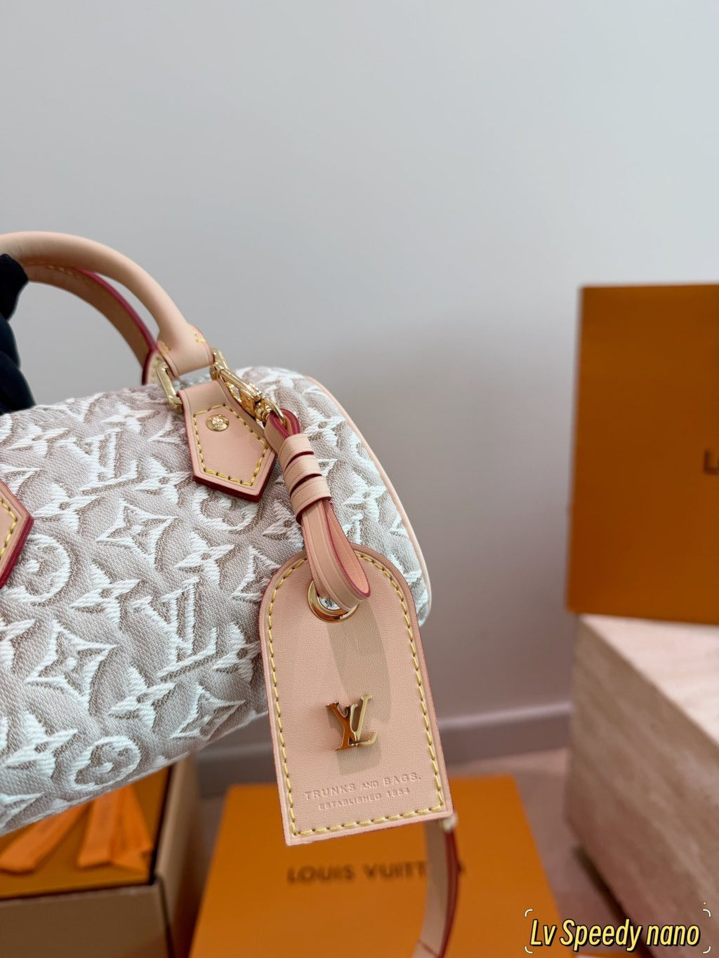 Louis Vuitton Raised Monogram Rounded Satchel — detail