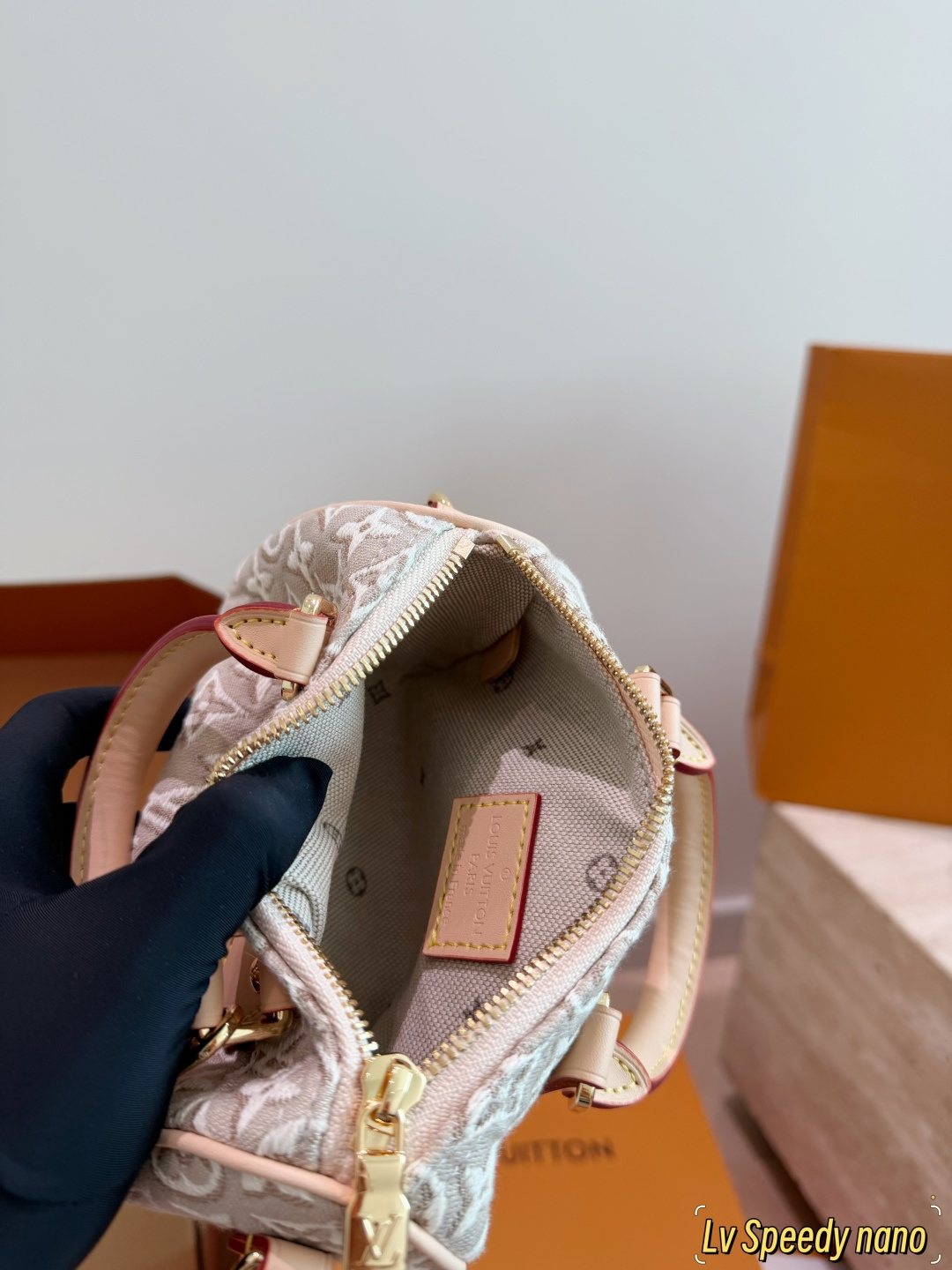 Louis Vuitton Raised Monogram Rounded Satchel — front