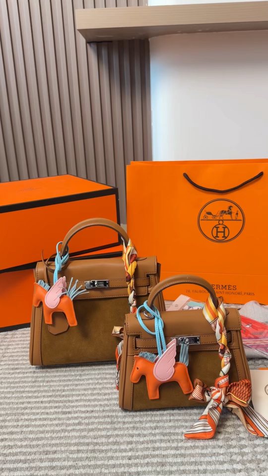 Hermès Kelly Top-Handle Bag with Silver-Tone Hardware — comparison