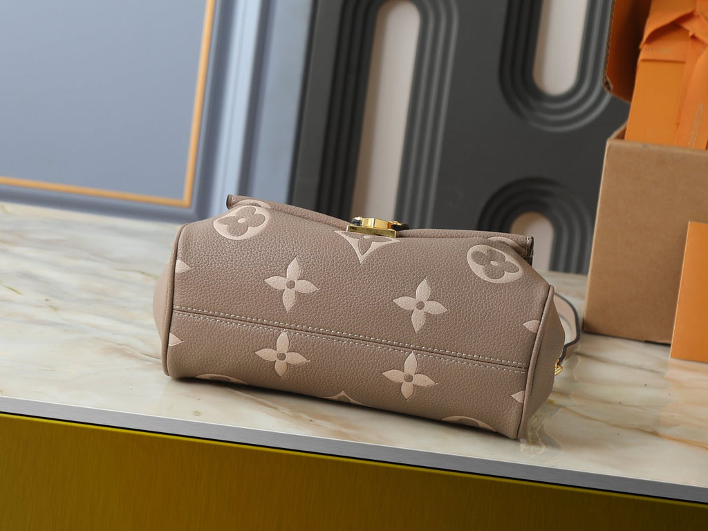 Louis Vuitton Favorite Monogram Empreinte Shoulder Bag — detail