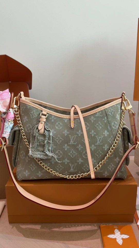 Louis Vuitton Carryall Cargo Monogram Denim Shoulder Bag — hero